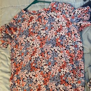 Blue, pink, and a lilac purple floral blouse.